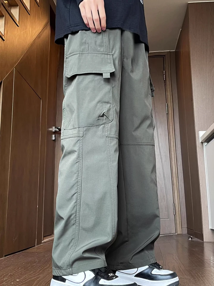 Streetwear Mens Cargo Pants Multi Woven Pocket Foot Rope Hip-Hop Baggy Trousers Solid Drawstring Parachute Pants Men Clothing